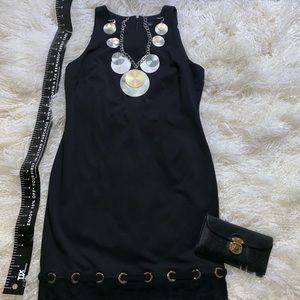 Black dress with gold trimming